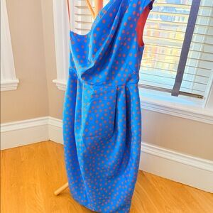 Blue and orange one-shoulder polka dotted dress. Very well-tailored.